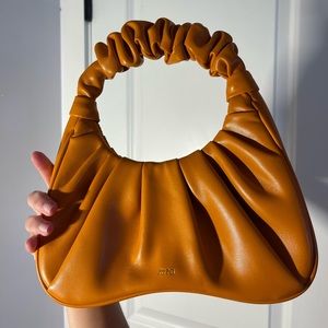JW PEI orange handbag